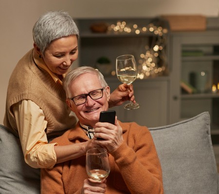 Granparents enjoy celebrating new years eve, while keeping in contact with family.